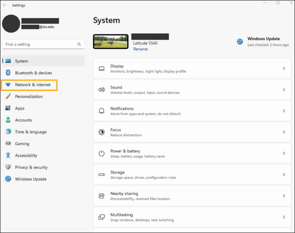 Screenshot of Settings window with Network & Internet highlighted.